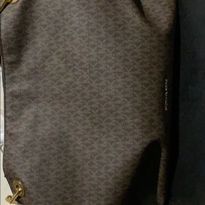 Brown and tan Michael Kors handbag